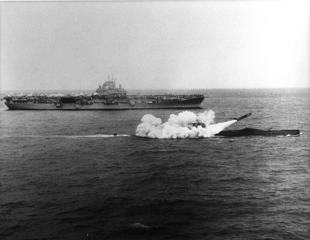 USS Halibut SSGN 587 firing a Regulus missile next to USS Lexington CV 16 25 March 1960