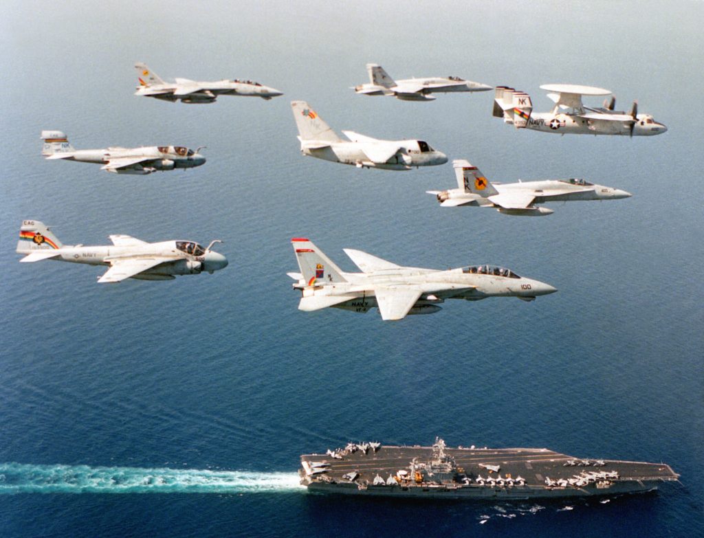 U.S. Navy aircraft assigned Carrier Air Wing 14 CVW 14 fly over the aircraft carrier USS Carl Vinson CVN 70 1024x783
